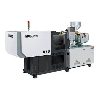 Machine de moulage par injection de composants électroniques